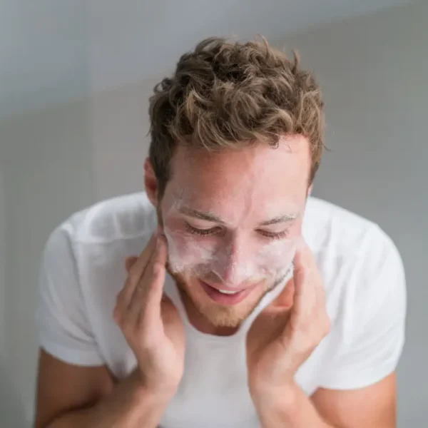 Men Washing Face With Facial Wash