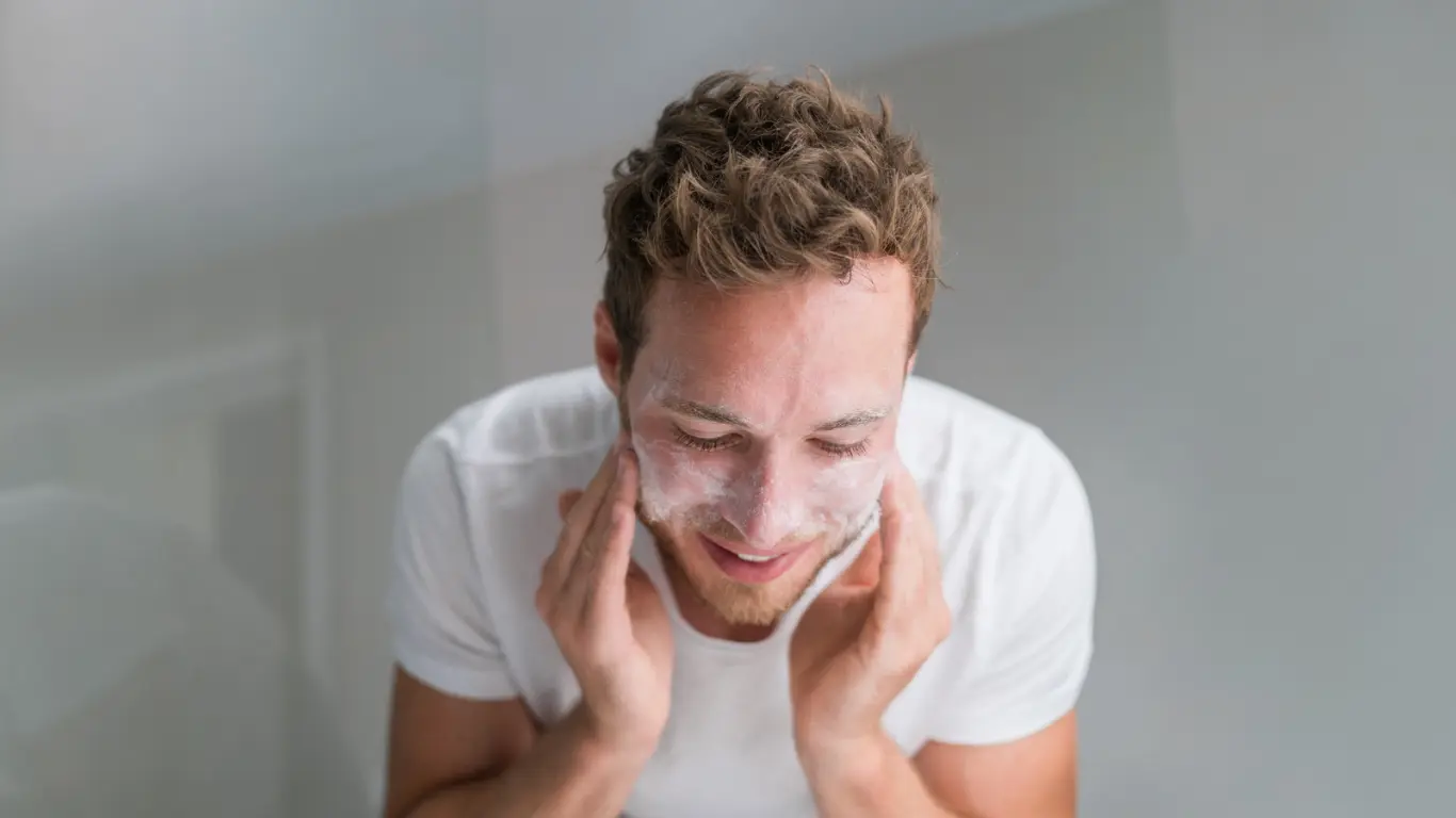 Men Washing Face With Facial Wash